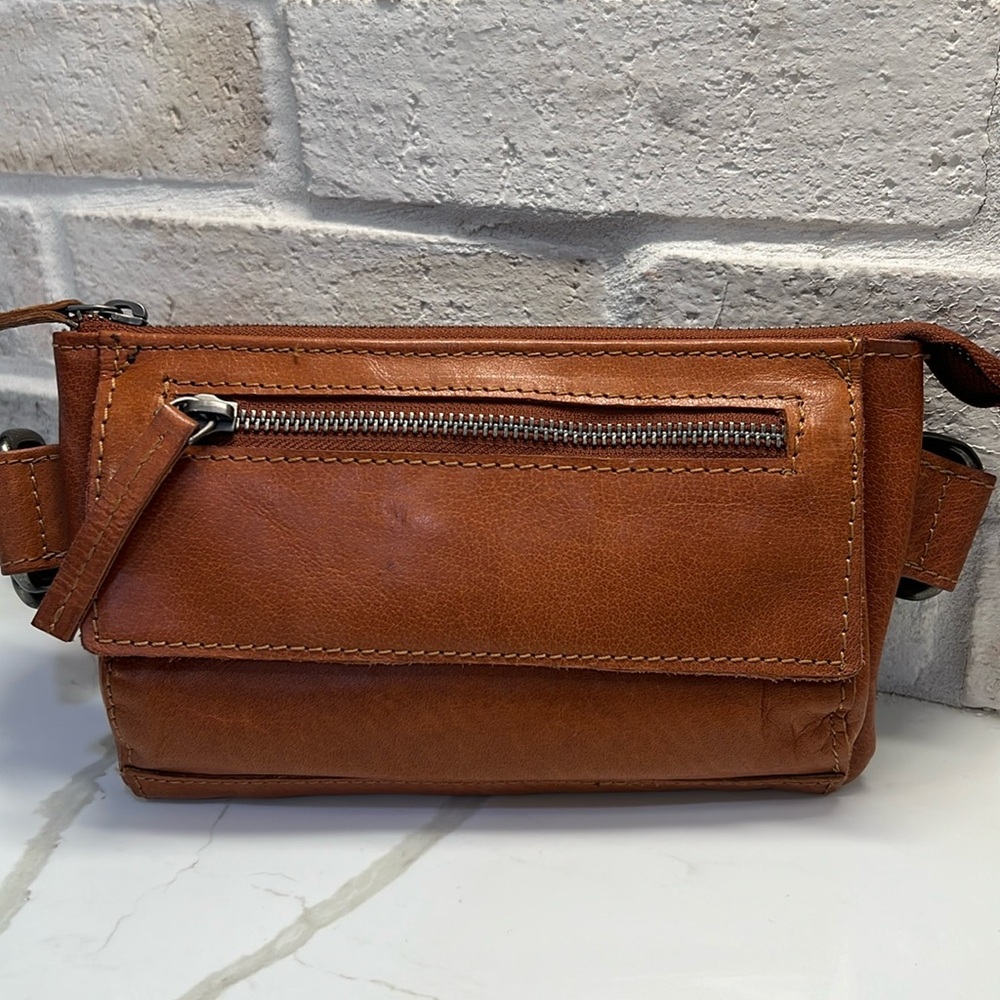 All leather spikes and sparrow belt bag